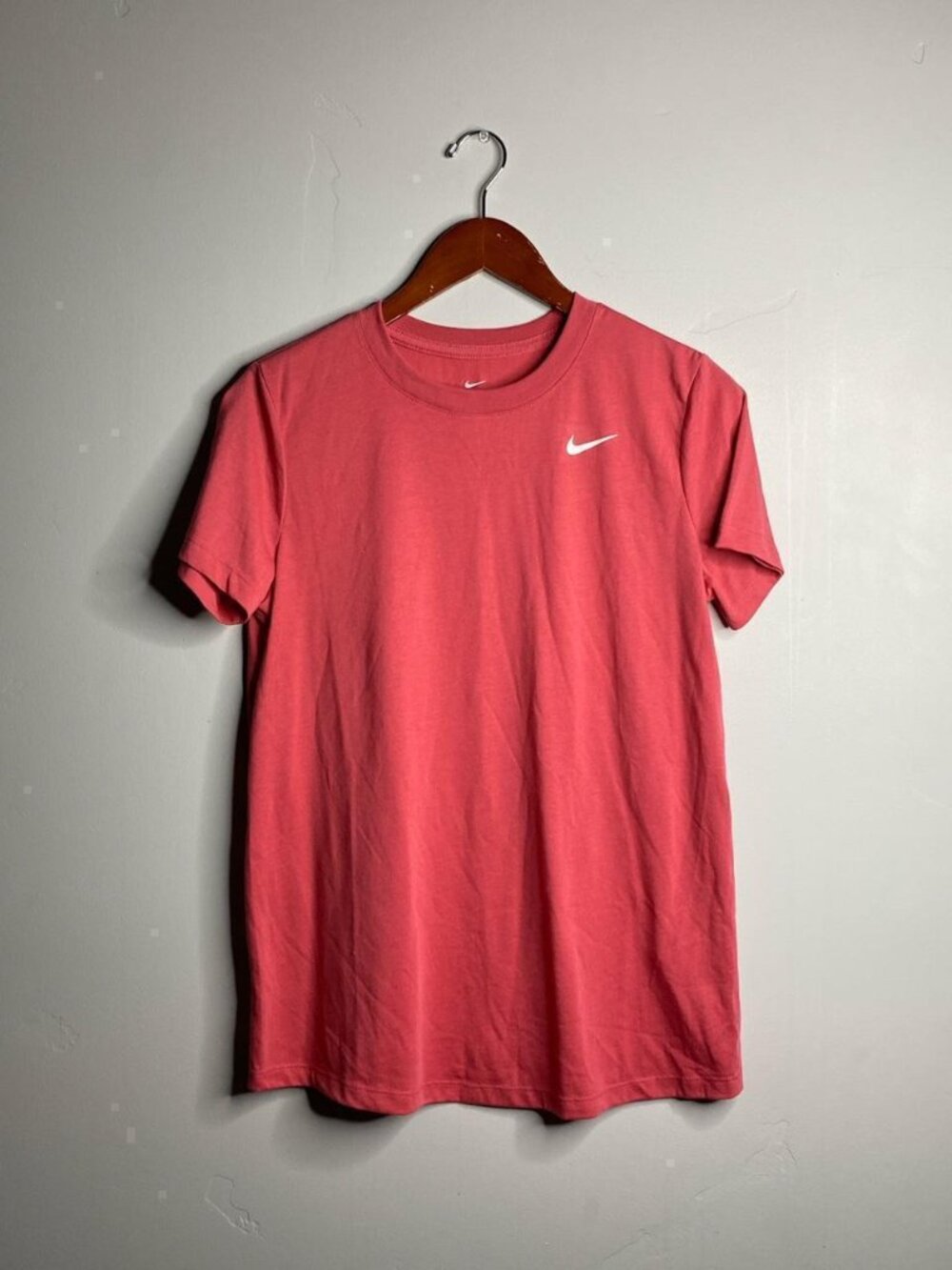 Pinkish Nike Tee size medium 75% polyester 13% cotton 12% rayon
